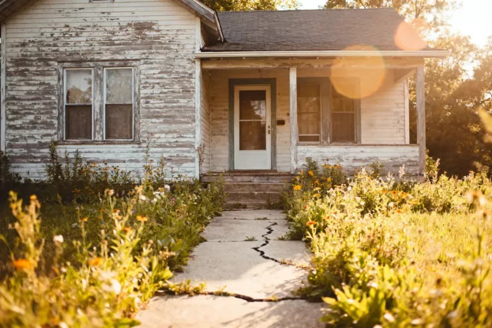 Red-brick century farmhouse on rural acreage being sold as-is near Essex, Ontario